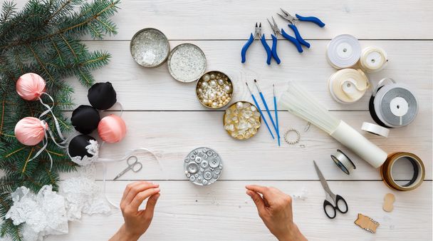 Creative diy hobby. Handmade christmas decoration, balls and garland - Фото, изображение