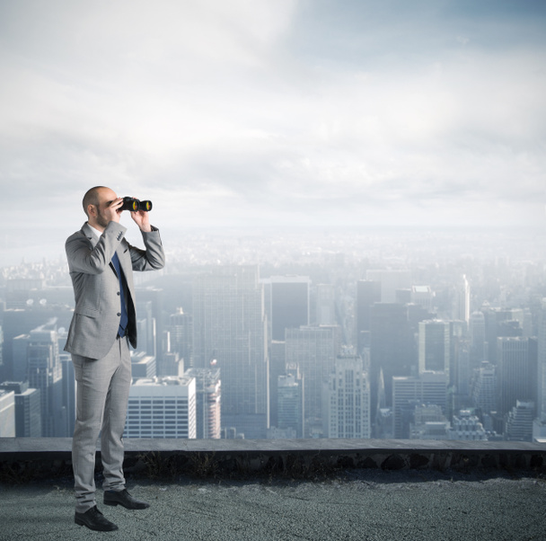 Businessman looking on  the city  - Photo, Image