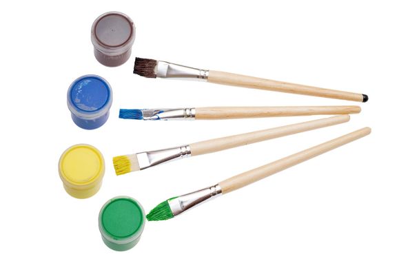 Paint brushes and paint on white background. - Photo, Image