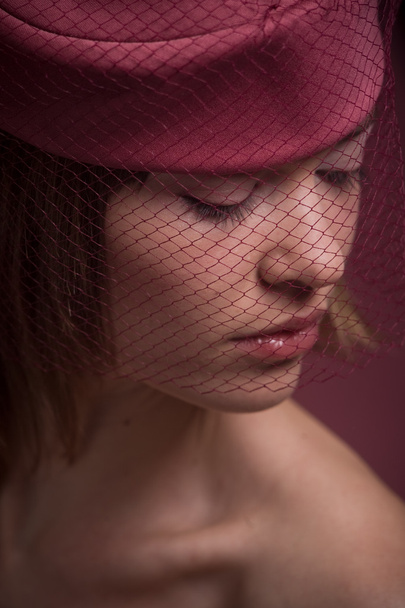 Woman in pink hat with veil - Zdjęcie, obraz