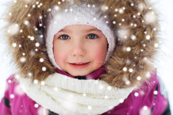 face of happy little kid or girl in winter clothes - Photo, image