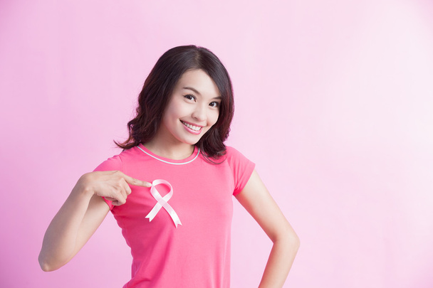 Woman showing  pink ribbon - Foto, immagini