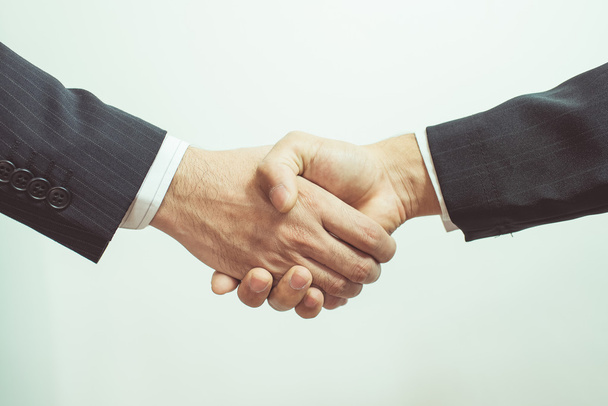 Homem de negócios. Business handshake e pessoas de negócios
 - Foto, Imagem