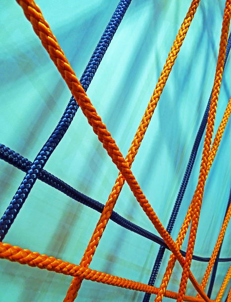 Хрест затягнуті різнокольорові мотузки
  - Фото, зображення