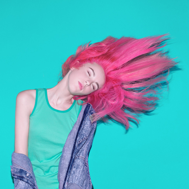 Life is motion. Bright girl with pink hair. Stylish stuff - Φωτογραφία, εικόνα
