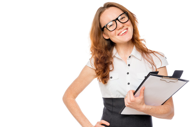 Successful businesswoman with folder posing on a white backgroun - Foto, imagen
