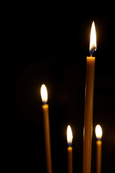 burning in the dark taper candles - Photo, Image