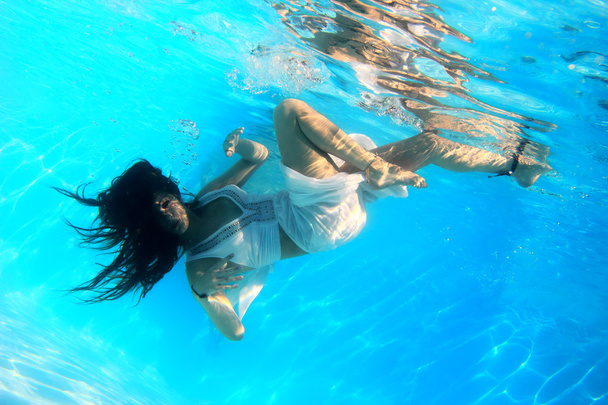 Woman wearing a white dress underwater - Zdjęcie, obraz