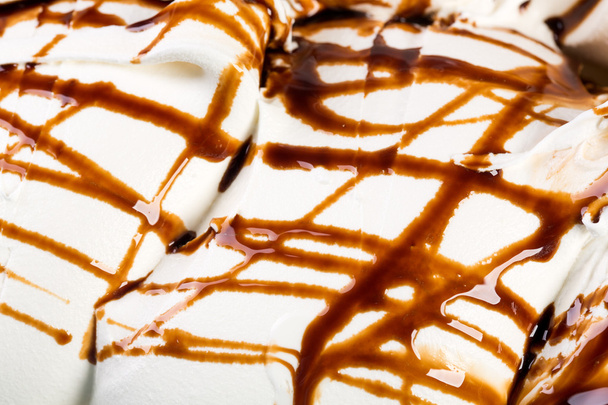 Vanilla ice-cream with chocolate glaze. - Photo, Image