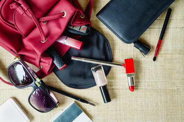 Top view of women bag stuff female cosmetic accessories - Foto, imagen