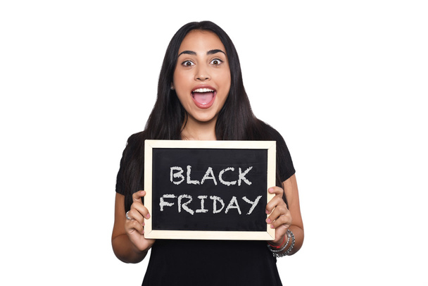 Woman holding chalkboard with text black friday. - Foto, imagen