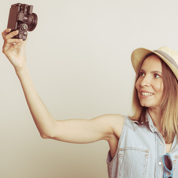 Woman taking selfie self picture with camera. - Фото, зображення