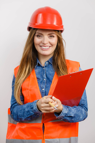 Woman engineer construction builder in helmet. - Foto, immagini