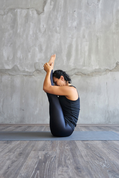 Woman practicing yoga in various poses  - Foto, Imagen