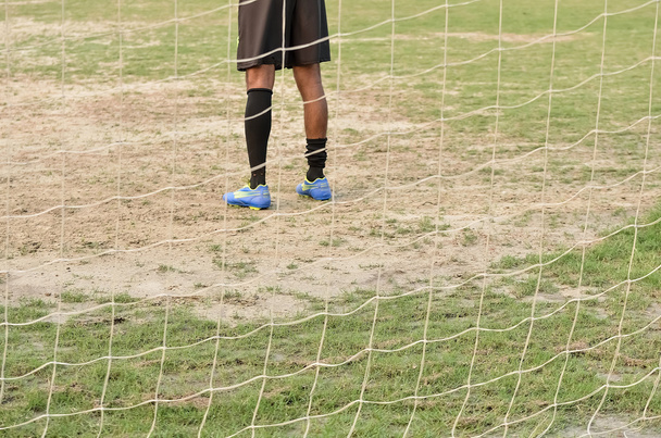 Ποδοσφαίρου τερματοφύλακας στέκεται  - Φωτογραφία, εικόνα