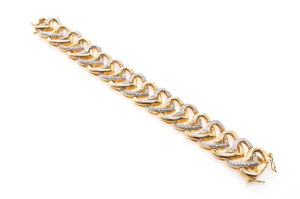 Gouden armband en diamanten sieraden - Foto, afbeelding