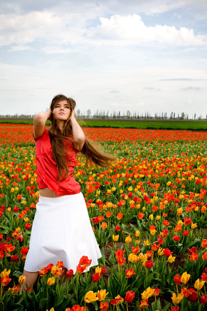 Woman in tulips field - Foto, Imagem
