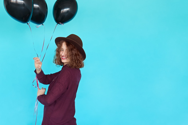 happy woman with black balloons - Photo, Image