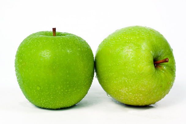 Doppia mela verde isolata su sfondo bianco
 - Foto, immagini