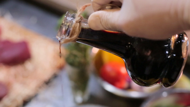 Chef pouring salad with sause - Felvétel, videó