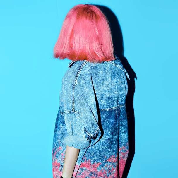 Girl with pink hair and denim clothing. Stylish look - Fotoğraf, Görsel