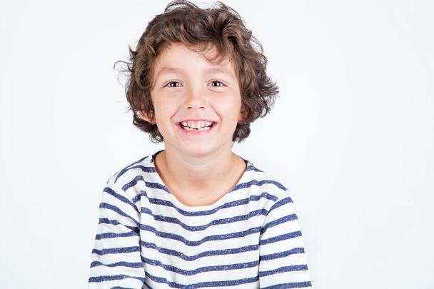 Close up portrait of happy cute little boy with curly hair  - Фото, зображення