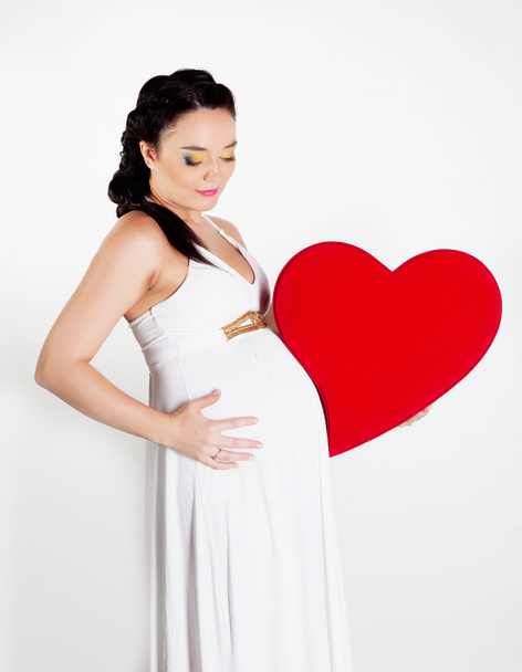 Pregnant woman in studio - Foto, Imagen