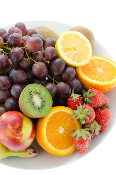 Fresh fruits on a wite plate and white background - Photo, Image