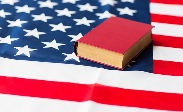 close up of american flag and book - Fotoğraf, Görsel