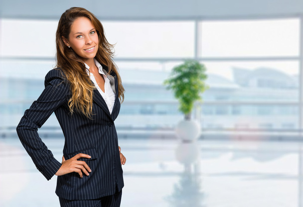 Beautiful businesswoman in office  - Photo, image
