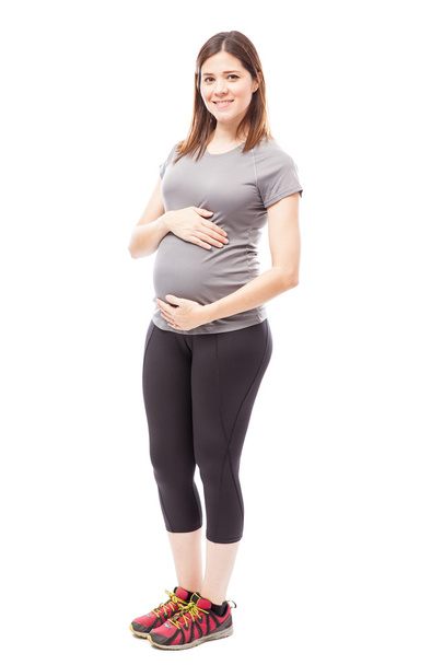 pregnant woman in sporty outfit  - Fotó, kép