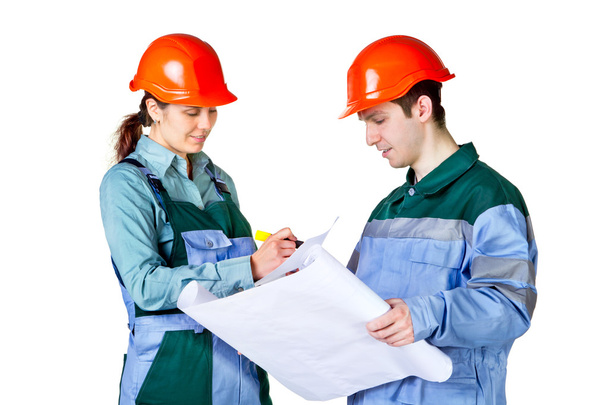 Isolated picture of young construction workers with blueprint - Photo, Image