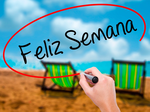 Man Hand writing Feliz Semana  (Happy Week in Spanish/Portuguese - Photo, Image