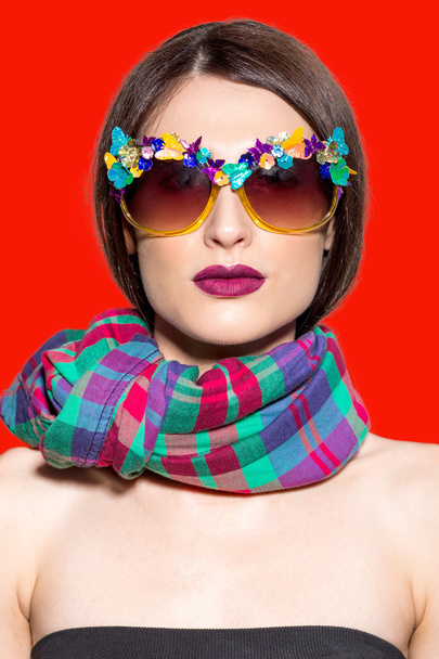 Portrait of fashioned woman in stylish sunglasses - Фото, изображение