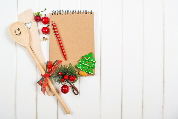 Livre de recettes de Noël sur fond woodem
. - Photo, image
