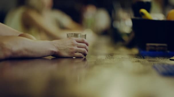 man holding glass with alcohol - Filmmaterial, Video