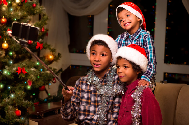 Three boys take Christmas selfie. - Photo, Image
