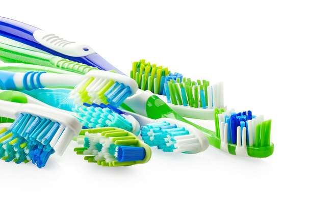 Blauwe en groene tandenborstels - Foto, afbeelding