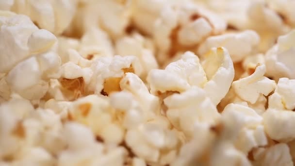 Fluffy popcorn macro, airy popped corn snack served at cinema, entertainment - Footage, Video