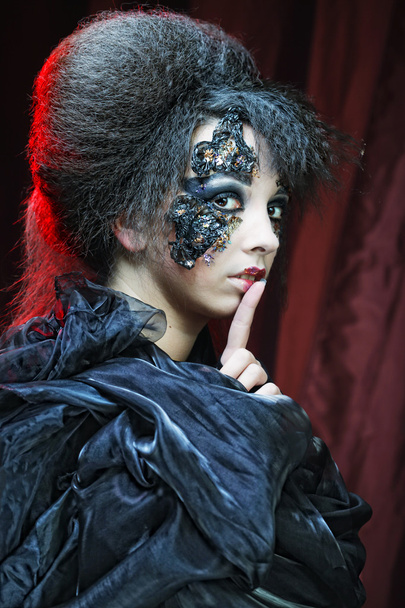 Woman with creative make up. Halloween theme. - Foto, imagen