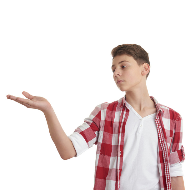 niedliche Teenager Junge über weißen isolierten Hintergrund - Foto, Bild