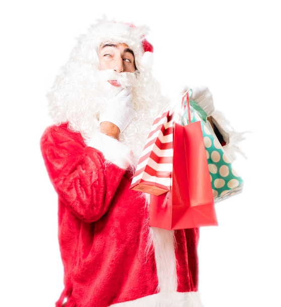 santa claus with shopping bags - Foto, afbeelding