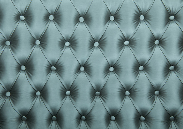 Текстура текстильної оббивки Teal Capitone
 - Фото, зображення