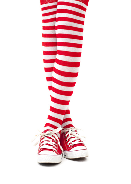 Жіночі ноги в шкарпетках на білому тлі
 - Фото, зображення