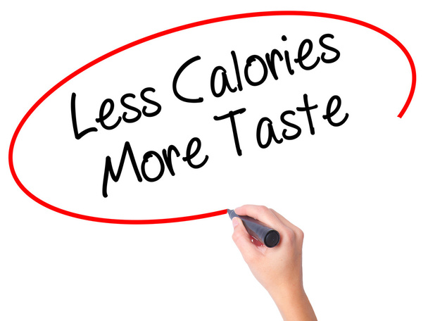 Women Hand writing Less Calories More Taste with black marker on - Photo, Image