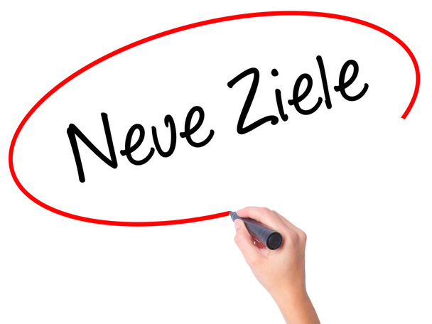 Women Hand writing Neue Ziele (New Goals in German)  with black  - Photo, Image