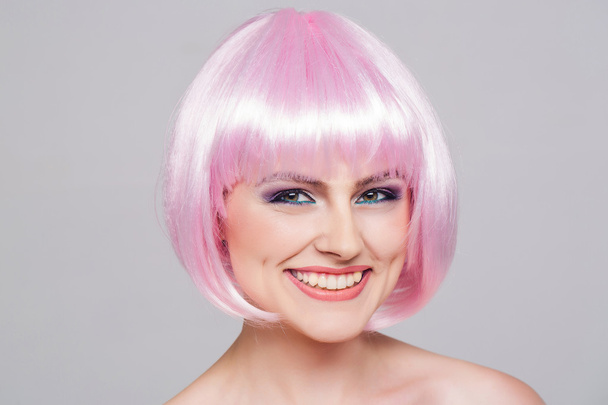 young pretty girl in pink wig - Φωτογραφία, εικόνα
