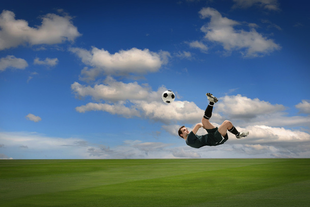 Joueur de football sur le terrain
 - Photo, image