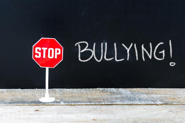 STOP BULLYING message written on chalkboard - Photo, Image