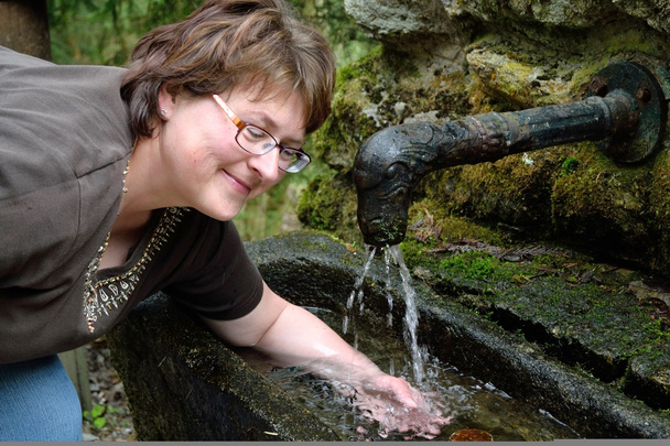 Woman with refreshing arm bath - Photo, Image